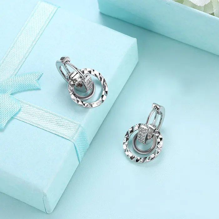 Yellow Chimes Earrings Yellow Chimes Designer Class Collection Silver Plated and Cubic Zirconia Hoop Earrings for Women SilverYCFJER147HOOPSL