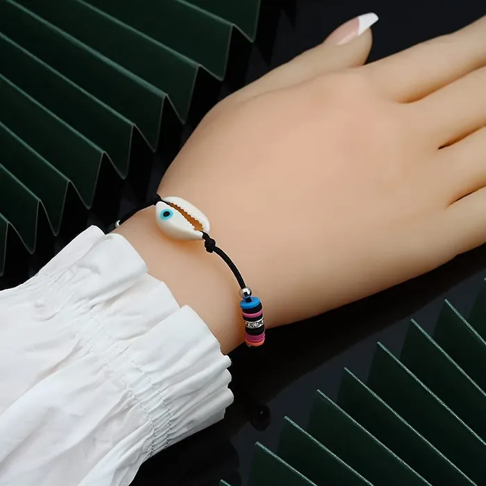 Yellow Chimes Exclusive Evil Eye Beads Gold Plated Adjustable Unisex Hand Bracelet for Men and Women Yellow Chimes Earrings
