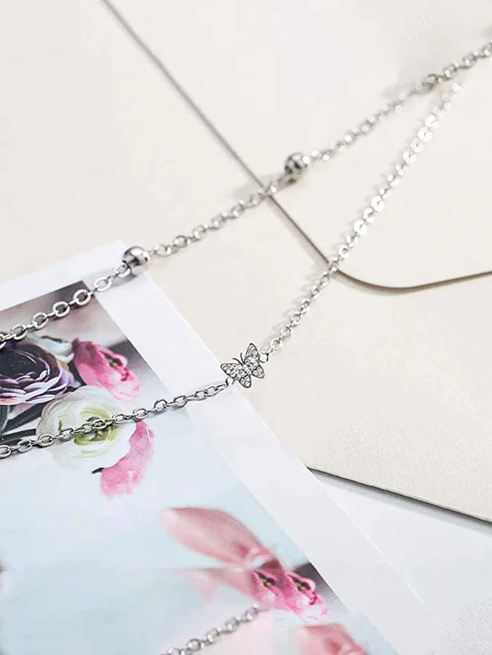 Yellow Chimes Multichain Anklets for Women Anklets with Crystal Studded Butterfly charm Silver toned AnkletsFoot Jewellery for Women and Girls Yellow Chimes Bracelets