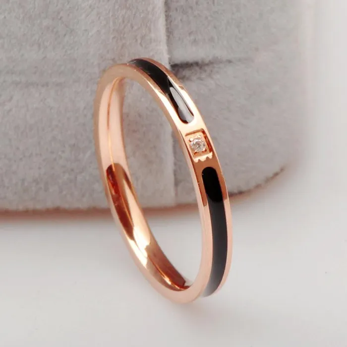 Yellow Chimes Yellow Chimes Rings for Women and Girls Fashion Black Band Ring Stainless Steel Rose Gold Plated Finger Ring for Women Birthday Gift For Girls Women Anniversary Gift for Wife Earrings