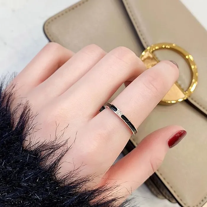 Yellow Chimes Yellow Chimes Rings for Women and Girls Fashion Black Band Ring Stainless Steel Rose Gold Plated Finger Ring for Women Birthday Gift For Girls Women Anniversary Gift for Wife Earrings